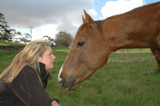 Emily on ground and horse